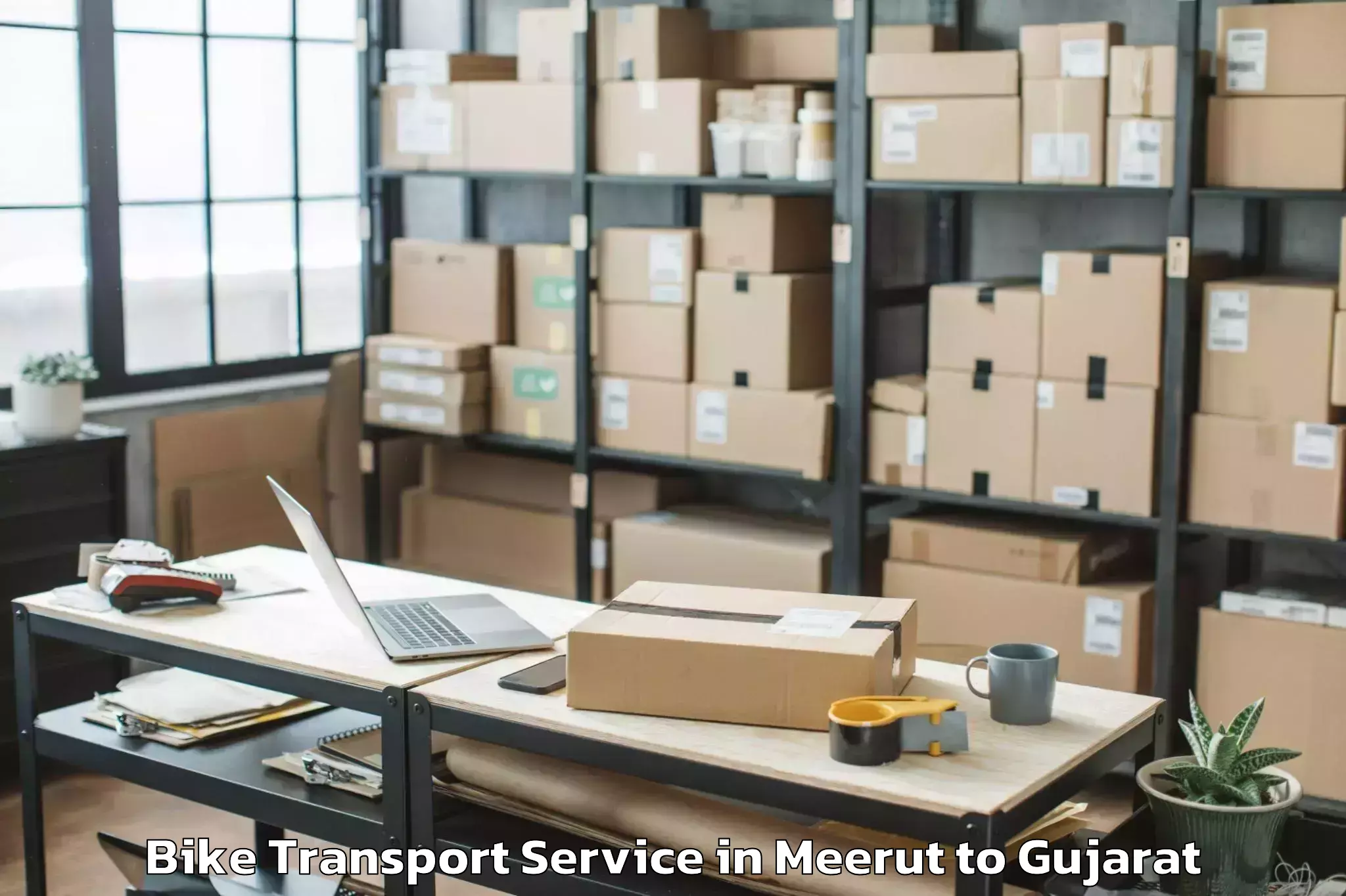 Book Meerut to Gujarat National Law Universit Bike Transport